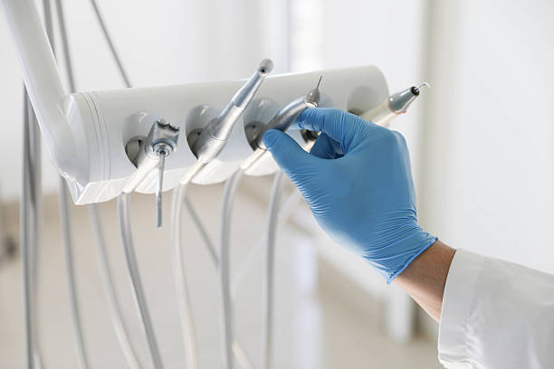 Professional Tooth Extraction technician working in North Potomac, MD